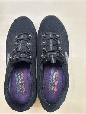 Skechers Women's Black Athletic Slip-On Sneakers with Purple Insoles